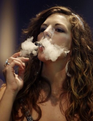 Woman Cigar Photo courtesy of http://www.spokesman.com